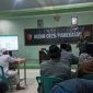 Rapat Koordinasi Pengelola SPPG Kecamatan Palengaan dengan Koordinator BGN Pamekasan di Aula Kodim 0826.