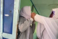 Tangkp layar dugaan aksi perundungan (bullying) di SMP Negeri 2 Pademawu, Kabupaten Pamekasan, Madura, Jawa Timur, viral di berbagai grup WhatsApp.