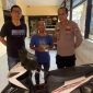 Kapolsek Purworejo Kompol Muljono menyerahkan motor Honda Beat yang hilang selama 5 tahun kepada pemiliknya, Mohamad Nurbuat, di Mapolsek Purworejo, Pasuruan.